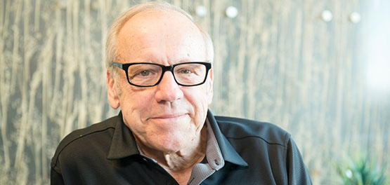 Patient headshot of man with glasses